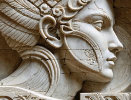 A composite image illustrating the transformation of stone sculpture, merging traditional stone carving tools with digital design elements, symbolizing the evolution from ancient techniques to modern innovation.