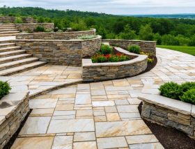 A panoramic view of different natural stone fence styles, including dry-stack, mortared, gabion, boulder, and stone veneer, blending harmoniously with the landscape.