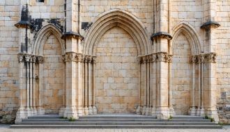 "Close-up of a medieval church's towering stone facade, showcasing intricate masonry and arches in soft natural light."