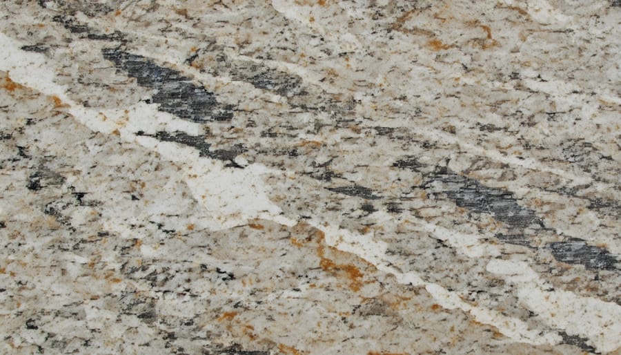 Close-up view of polished granite countertop edge profile in modern kitchen