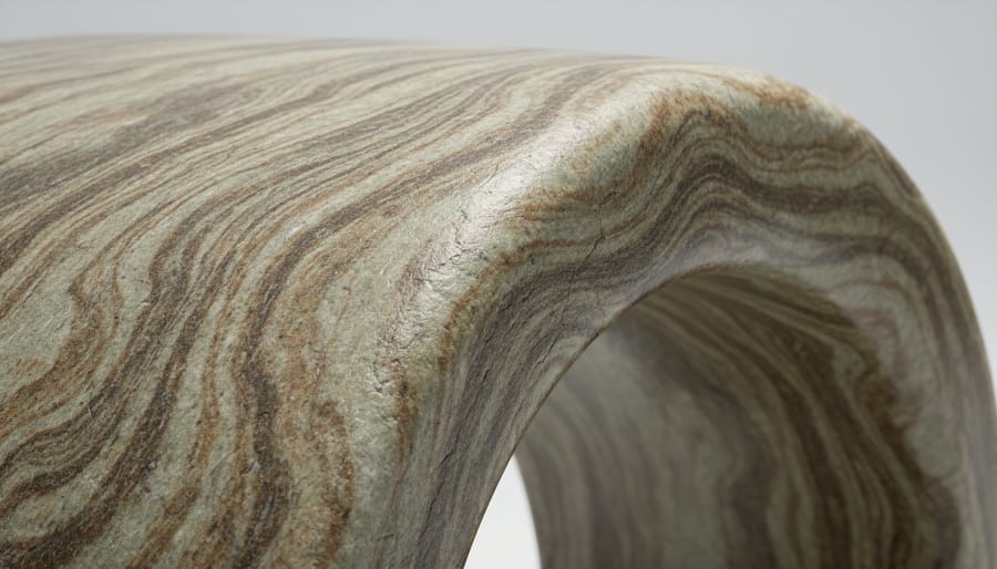 Close-up of natural stone veining showing flowing curved patterns