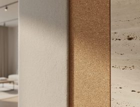 Natural acoustic materials in a modern interior, showing textured wool, cork or wood-fiber panels, and porous limestone/travertine stone surfaces for sound absorption.